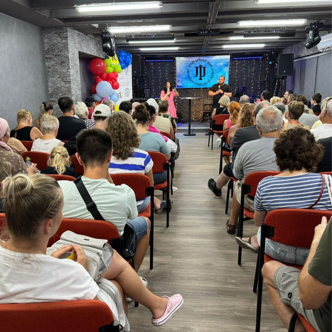 A JIJ Know Your Rights event with a full room